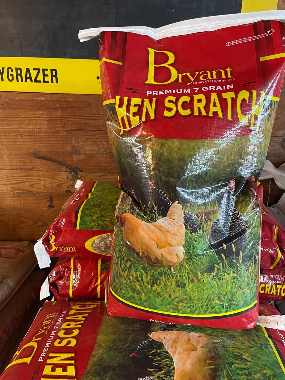 A bag of Bryant premium hen scratch feed stocked on the shelf at Mustang Creek Feed Seed & Supply in Rio Vista, Texas