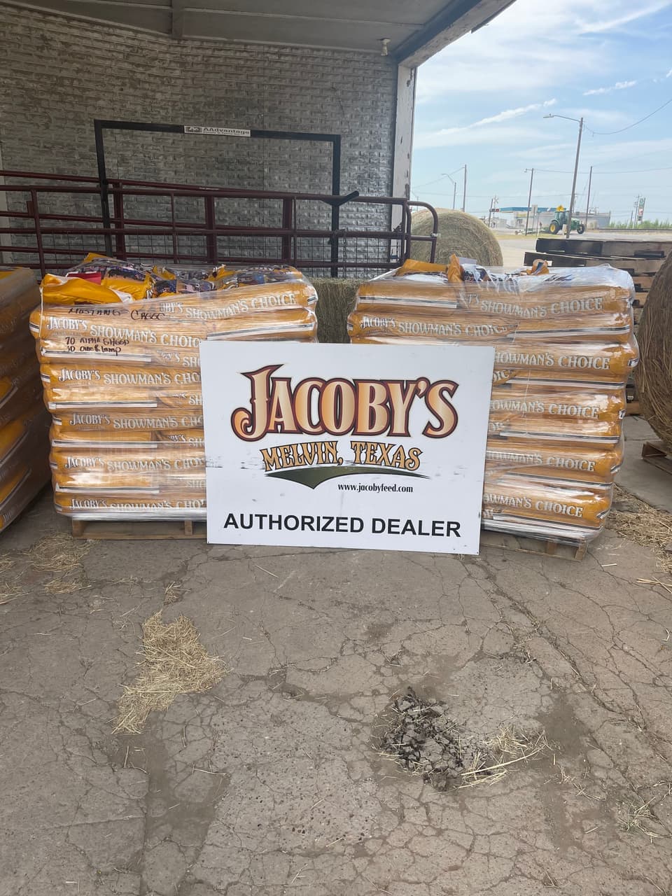 Pallets of Jacoby's Showman's Choice show feed for sheep and lambs at Mustang Creek Feed Seed & Supply, an authorized Jacoby's dealer in Rio Vista, Texas